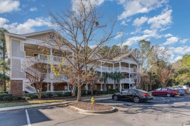 This top floor, fully furnished condo at River Crossing in on Barefoot Resort and Golf Club - Norman Course in South Carolina - for sale on GolfHomes.com, golf home, golf lot