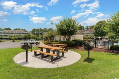 This top floor, fully furnished condo at River Crossing in on Barefoot Resort and Golf Club - Norman Course in South Carolina - for sale on GolfHomes.com, golf home, golf lot