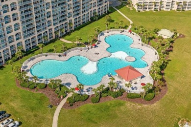 This top floor, fully furnished condo at River Crossing in on Barefoot Resort and Golf Club - Norman Course in South Carolina - for sale on GolfHomes.com, golf home, golf lot