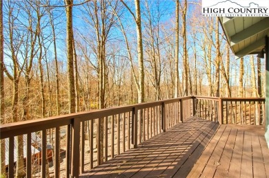 Charming Mountain Retreat: 3-Bedroom, 2-Bath Round House on Beech Mountain Club in North Carolina - for sale on GolfHomes.com, golf home, golf lot