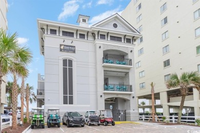 This top floor, fully furnished condo at River Crossing in on Barefoot Resort and Golf Club - Norman Course in South Carolina - for sale on GolfHomes.com, golf home, golf lot