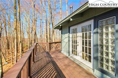 Charming Mountain Retreat: 3-Bedroom, 2-Bath Round House on Beech Mountain Club in North Carolina - for sale on GolfHomes.com, golf home, golf lot