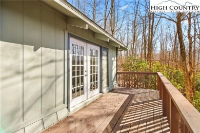 Charming Mountain Retreat: 3-Bedroom, 2-Bath Round House on Beech Mountain Club in North Carolina - for sale on GolfHomes.com, golf home, golf lot