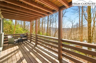 Charming Mountain Retreat: 3-Bedroom, 2-Bath Round House on Beech Mountain Club in North Carolina - for sale on GolfHomes.com, golf home, golf lot