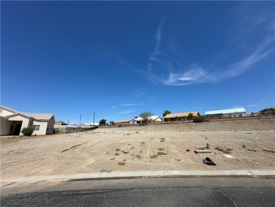 Nestled inside the gated Los Lagos community, this oversized lot on Los Lagos Golf Club in Arizona - for sale on GolfHomes.com, golf home, golf lot
