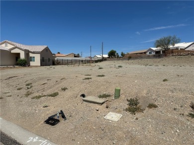 Nestled inside the gated Los Lagos community, this oversized lot on Los Lagos Golf Club in Arizona - for sale on GolfHomes.com, golf home, golf lot