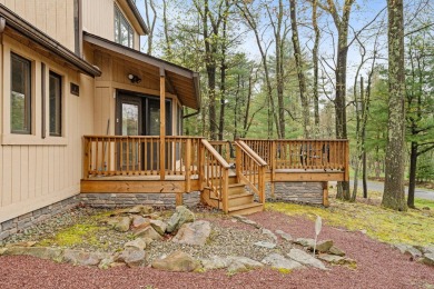 Discover the perfect mountain retreat at this contemporary home on Split Rock Resort and Country Club in Pennsylvania - for sale on GolfHomes.com, golf home, golf lot