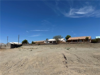 Nestled inside the gated Los Lagos community, this oversized lot on Los Lagos Golf Club in Arizona - for sale on GolfHomes.com, golf home, golf lot