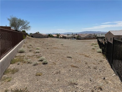 Nestled inside the gated Los Lagos community, this oversized lot on Los Lagos Golf Club in Arizona - for sale on GolfHomes.com, golf home, golf lot