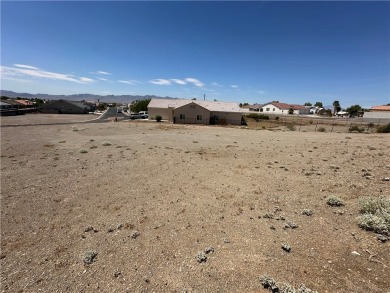 Nestled inside the gated Los Lagos community, this oversized lot on Los Lagos Golf Club in Arizona - for sale on GolfHomes.com, golf home, golf lot