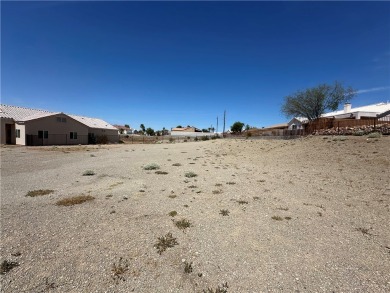 Nestled inside the gated Los Lagos community, this oversized lot on Los Lagos Golf Club in Arizona - for sale on GolfHomes.com, golf home, golf lot