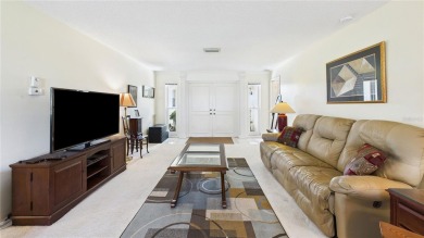 Welcome to this charming and spacious 2-bedroom, 2-bath end-unit on Palm Aire Country Club of Sarasota in Florida - for sale on GolfHomes.com, golf home, golf lot