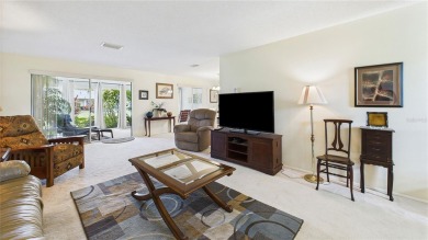 Welcome to this charming and spacious 2-bedroom, 2-bath end-unit on Palm Aire Country Club of Sarasota in Florida - for sale on GolfHomes.com, golf home, golf lot