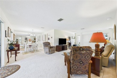 Welcome to this charming and spacious 2-bedroom, 2-bath end-unit on Palm Aire Country Club of Sarasota in Florida - for sale on GolfHomes.com, golf home, golf lot