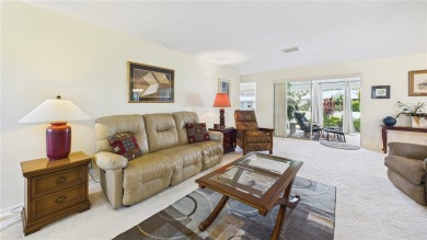 Welcome to this charming and spacious 2-bedroom, 2-bath end-unit on Palm Aire Country Club of Sarasota in Florida - for sale on GolfHomes.com, golf home, golf lot