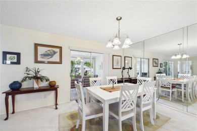 Welcome to this charming and spacious 2-bedroom, 2-bath end-unit on Palm Aire Country Club of Sarasota in Florida - for sale on GolfHomes.com, golf home, golf lot