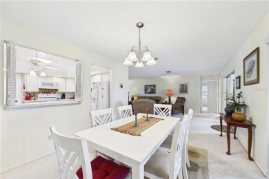 Welcome to this charming and spacious 2-bedroom, 2-bath end-unit on Palm Aire Country Club of Sarasota in Florida - for sale on GolfHomes.com, golf home, golf lot