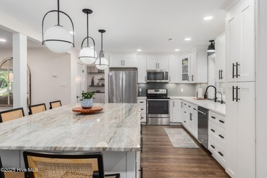 Discover the ultimate coastal lifestyle in this beautifully on The Country Club of the Crystal Coast in North Carolina - for sale on GolfHomes.com, golf home, golf lot