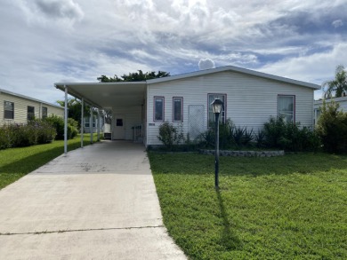 Mobile home located in Savanna Club where you own the land!  A on Savanna Golf Club in Florida - for sale on GolfHomes.com, golf home, golf lot