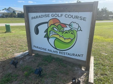 Own 0.89 acres to build your dream home on the first hole of the on Sunnybreeze Golf Course in Florida - for sale on GolfHomes.com, golf home, golf lot