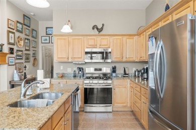 This 2 bedroom and 2 bathroom immaculate ranch townhome with 10 on Tournament Club of Iowa in Iowa - for sale on GolfHomes.com, golf home, golf lot