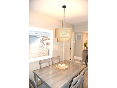 Watch the sunset on the Bay from this  condo's extensive veranda on Sandestin Golf and Beach Resort - Raven in Florida - for sale on GolfHomes.com, golf home, golf lot