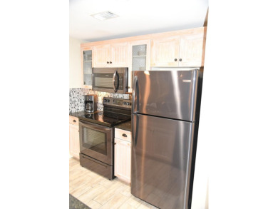 Watch the sunset on the Bay from this  condo's extensive veranda on Sandestin Golf and Beach Resort - Raven in Florida - for sale on GolfHomes.com, golf home, golf lot