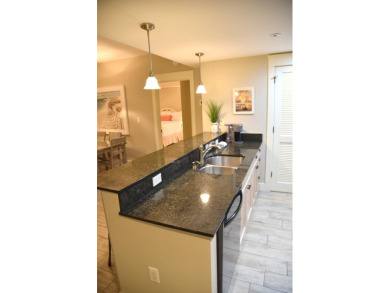 Watch the sunset on the Bay from this  condo's extensive veranda on Sandestin Golf and Beach Resort - Raven in Florida - for sale on GolfHomes.com, golf home, golf lot
