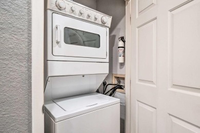 Freshly updated ground floor condo overlooking the water on Holiday Hills Resort and Golf in Missouri - for sale on GolfHomes.com, golf home, golf lot