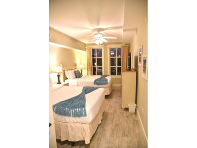 Watch the sunset on the Bay from this  condo's extensive veranda on Sandestin Golf and Beach Resort - Raven in Florida - for sale on GolfHomes.com, golf home, golf lot