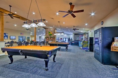 Freshly updated ground floor condo overlooking the water on Holiday Hills Resort and Golf in Missouri - for sale on GolfHomes.com, golf home, golf lot