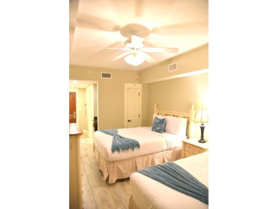 Watch the sunset on the Bay from this  condo's extensive veranda on Sandestin Golf and Beach Resort - Raven in Florida - for sale on GolfHomes.com, golf home, golf lot