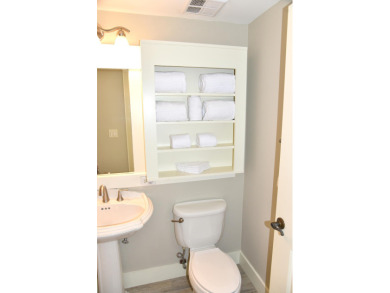 Watch the sunset on the Bay from this condo's extensive veranda on Sandestin Golf and Beach Resort - Raven in Florida - for sale on GolfHomes.com, golf home, golf lot