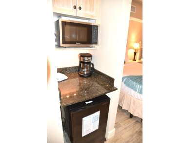 Watch the sunset on the Bay from this condo's extensive veranda on Sandestin Golf and Beach Resort - Raven in Florida - for sale on GolfHomes.com, golf home, golf lot