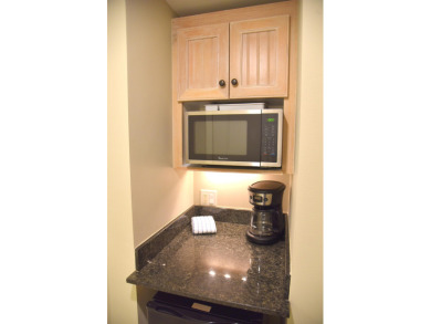 Watch the sunset on the Bay from this condo's extensive veranda on Sandestin Golf and Beach Resort - Raven in Florida - for sale on GolfHomes.com, golf home, golf lot