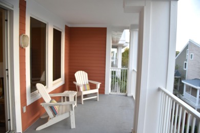 Watch the sunset on the Bay from this condo's extensive veranda on Sandestin Golf and Beach Resort - Raven in Florida - for sale on GolfHomes.com, golf home, golf lot