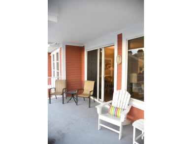 Watch the sunset on the Bay from this condo's extensive veranda on Sandestin Golf and Beach Resort - Raven in Florida - for sale on GolfHomes.com, golf home, golf lot