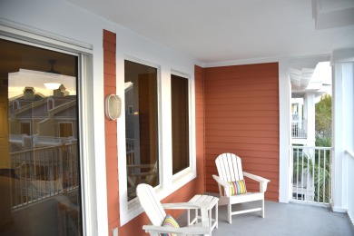 Watch the sunset on the Bay from this condo's extensive veranda on Sandestin Golf and Beach Resort - Raven in Florida - for sale on GolfHomes.com, golf home, golf lot