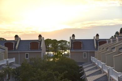 Watch the sunset on the Bay from this condo's extensive veranda on Sandestin Golf and Beach Resort - Raven in Florida - for sale on GolfHomes.com, golf home, golf lot