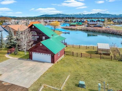 Lakefront mountain living, exceptionally priced. Single-level on Pagosa Springs Golf Club in Colorado - for sale on GolfHomes.com, golf home, golf lot