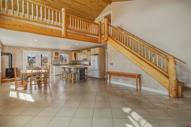 Lakefront mountain living, exceptionally priced. Single-level on Pagosa Springs Golf Club in Colorado - for sale on GolfHomes.com, golf home, golf lot