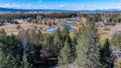 Elevated building lot in Eagle Bend with expansive views of the on Eagle Bend Golf Course in Montana - for sale on GolfHomes.com, golf home, golf lot