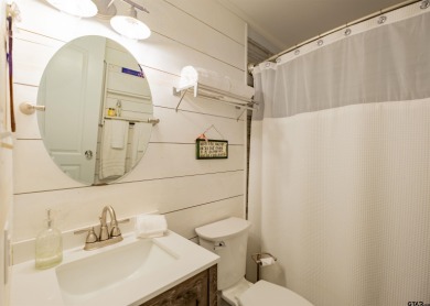 **Lakefront Charm Meets Updated Comfort in Hideaway Lake** on Hide-A-Way Lake Golf Course in Texas - for sale on GolfHomes.com, golf home, golf lot