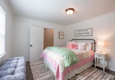 **Lakefront Charm Meets Updated Comfort in Hideaway Lake** on Hide-A-Way Lake Golf Course in Texas - for sale on GolfHomes.com, golf home, golf lot