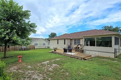 Sitting on 1.55 pristine, park-like acres within walking on Holiday Island Executive Golf Course in Arkansas - for sale on GolfHomes.com, golf home, golf lot