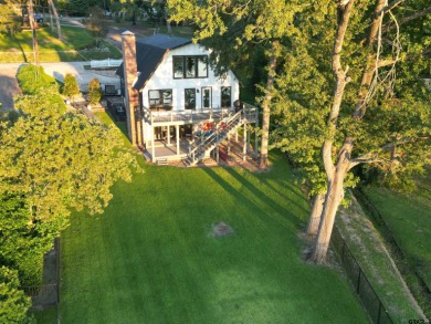**Lakefront Charm Meets Updated Comfort in Hideaway Lake** on Hide-A-Way Lake Golf Course in Texas - for sale on GolfHomes.com, golf home, golf lot
