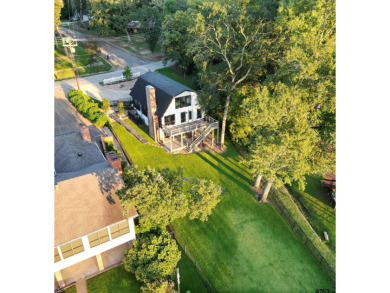 **Lakefront Charm Meets Updated Comfort in Hideaway Lake** on Hide-A-Way Lake Golf Course in Texas - for sale on GolfHomes.com, golf home, golf lot