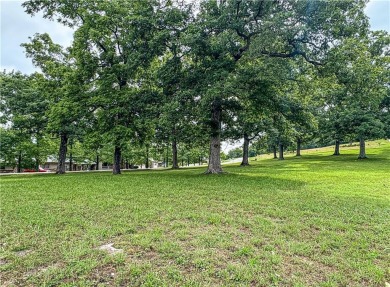 Sitting on 1.55 pristine, park-like acres within walking on Holiday Island Executive Golf Course in Arkansas - for sale on GolfHomes.com, golf home, golf lot