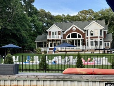 Coastal Waterfront Living at Its Finest  Welcome to a rare on Duck Woods Country Club in North Carolina - for sale on GolfHomes.com, golf home, golf lot