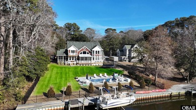 Coastal Waterfront Living at Its Finest  Welcome to a rare on Duck Woods Country Club in North Carolina - for sale on GolfHomes.com, golf home, golf lot
